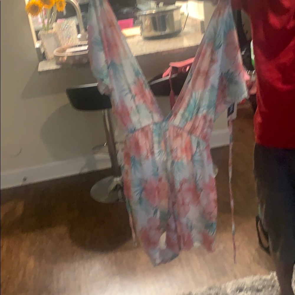 Topical roomper with belt